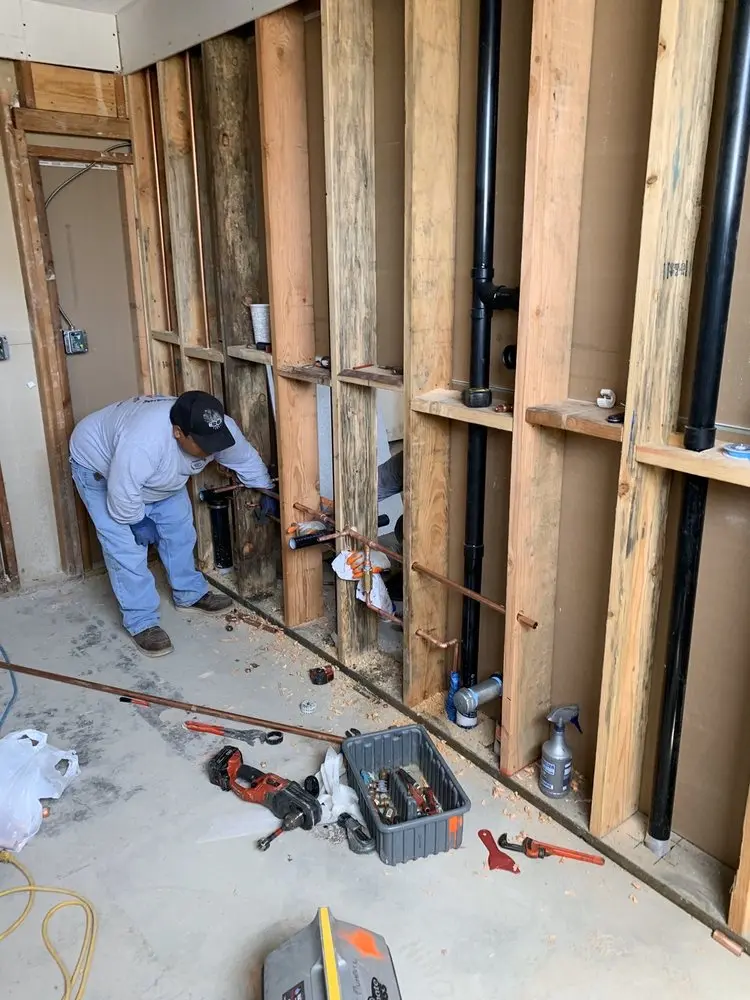 Commercial rough-in plumbing for Water Heater Replacement in South Juanita